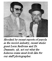 [Shocked by recent reports of payola
in the record industry, recent studio guest Leon Redbone and Dr.
Demento, uh, act out what the hideous crime must look like for our
staff photographer.]
