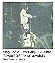 [Bobby 'Boris' Pickett sings his
classic 'Monster Mash' for an appreciative Pasadena
audience.]