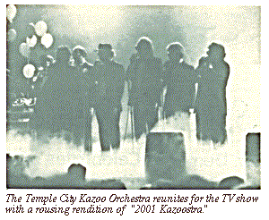 [The Temple City Kazoo Orchestra
reunites for the TV show with a rousing rendition of '2001
Kazoostra.']
